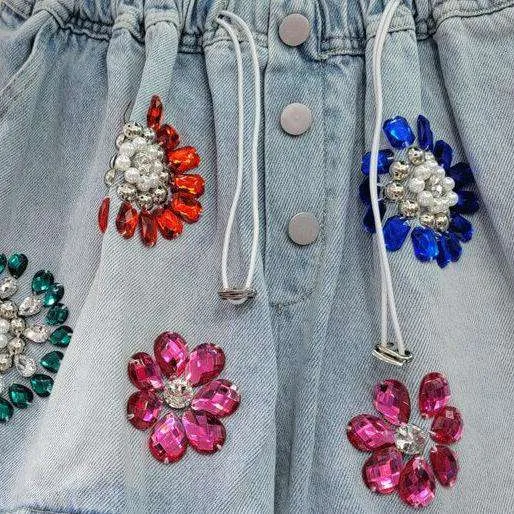 Baggy flower-embellished denim shorts