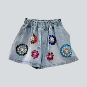 Baggy flower-embellished denim shorts