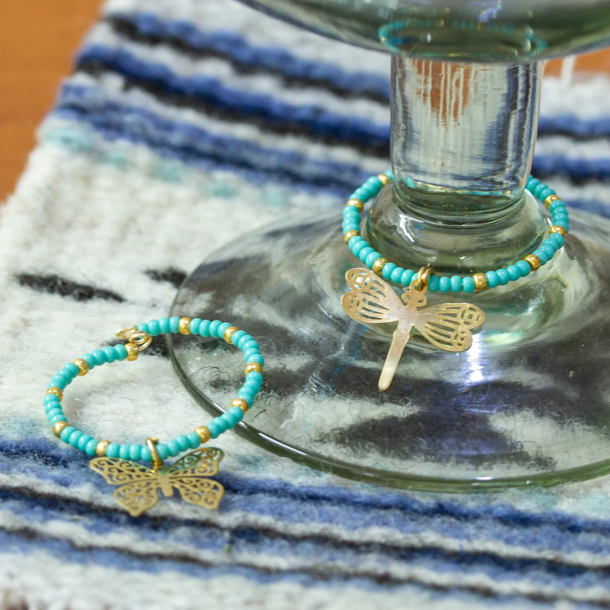 Set of 2 Handmade Beaded Drink Markers with Golden Pendants - Turquoise Flutter | NOVICA